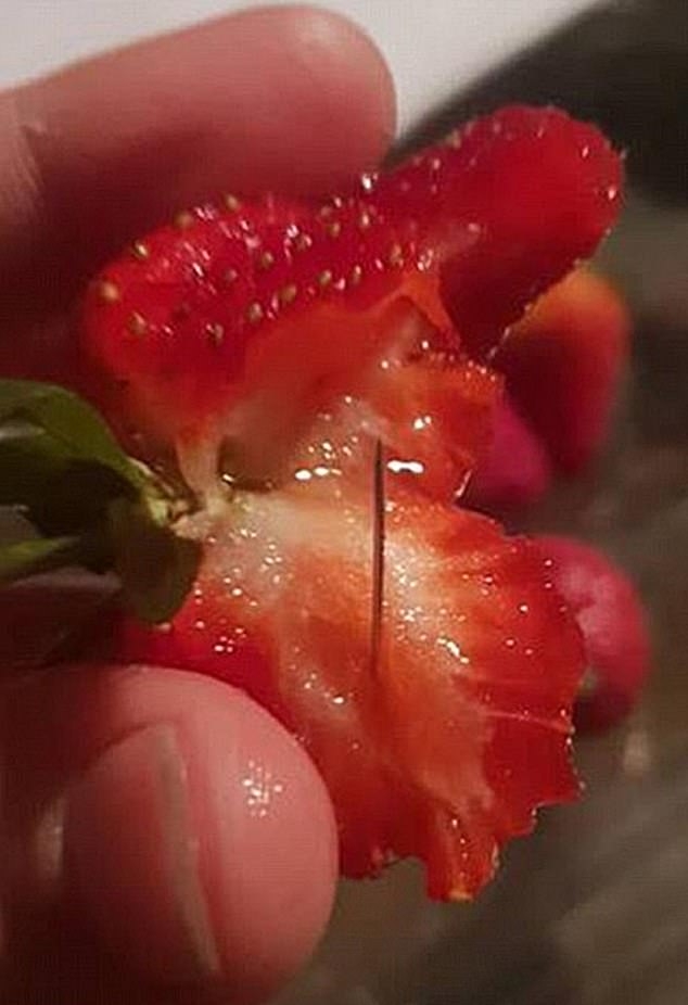 6040198-6376973-Needles_were_then_found_in_packets_of_strawberries_nation_wide_a.jpg