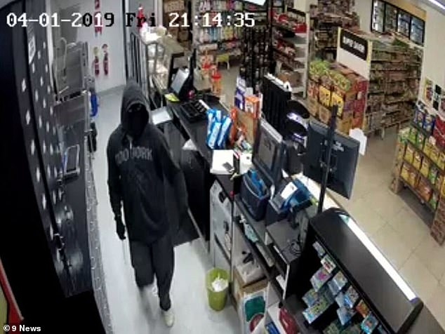 8218626-6564529-Footage_captured_the_hooded_thief_walking_into_the_Slade_Point_N.jpg